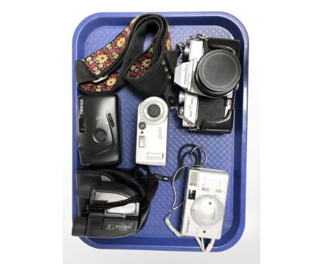 Several vintage cameras including Minolta, Mamiya, a pair of Sigma 10x25 binoculars.