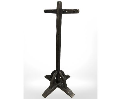 An oak cruciform hat and coat stand, height 179 cm.