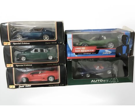 Three Maisto 1:18 scale die cast model vehicles, a further James Bond 'Die Another Day' Jaguar Roadster and a further Auto Ar