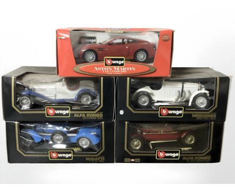 Five Burago 1:18 scale die cast model vehicles in boxes.