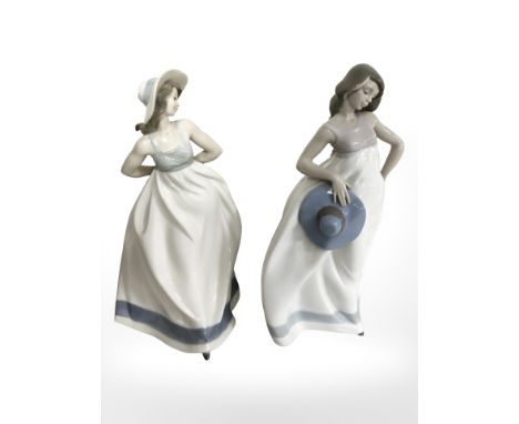 Two Nao figures of ladies in summer dresses, height 33 cm.