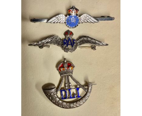 Two silver and enamel RAF wings badges; a silver and enamel Light Infantry, Durham badge