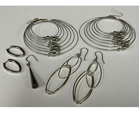 Modern Design - Jewellery - a pair of silver earrings, composed of kinetic beads on graduated hoop tracks; others; a Georg Je