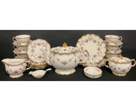 A Royal Crown Derby Royal Antoinette pattern part tea service, comprising teapot, sucrier and cover, cream jug, tea strainer 