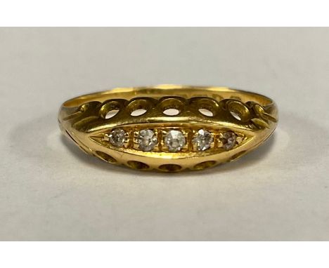 A 18ct gold diamond ring, with five old round brilliant cut graduated diamonds, 18ct gold shank, size N, Chester 1913, 2g gro