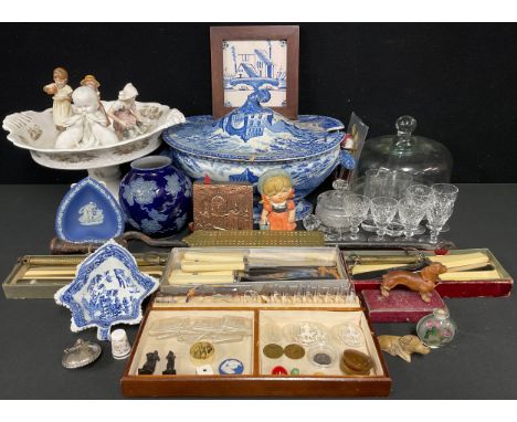 A 19th century blue and white tureen and cover, 22cm high; others including a 19th century cake stand, transfer printed with 