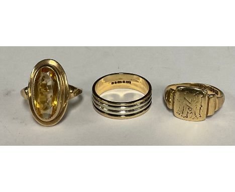 A two tone yellow and white 9ct gold band ring, 9ct gold signet ring,  9ct gold oval citrine ring, 11,1g gross (3)
