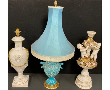 An Italian Jaffe Rose porcelain urnular table lamp, applied with flowers and gilt painted rope twist swags, 50cm high over fi