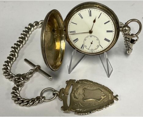 A Victorian silver hunter pocket watch, white dial, Roman numerals, subsidiary seconds, London 1855, 49mm diameter engine tur