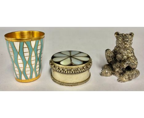 A USSR Soviet enamel Stopka vodka cup, 4.5cm; a round Mother of Pearl flower box, silver plated; an Argento Laminato bear, 4c