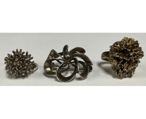 Modern Design - Jewellery - a Danish silver brooch, by Niels Erik From; a Danish silver-gilt ring; another, similar (3)