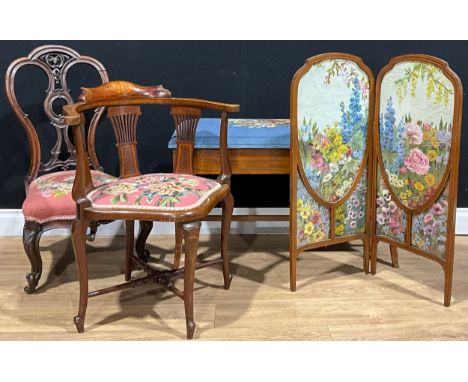 An Edwardian mahogany bi-fold fire screen, 86cm high, each panel 35cm wide; a Victorian rosewood nursing chair; an Edwardian 