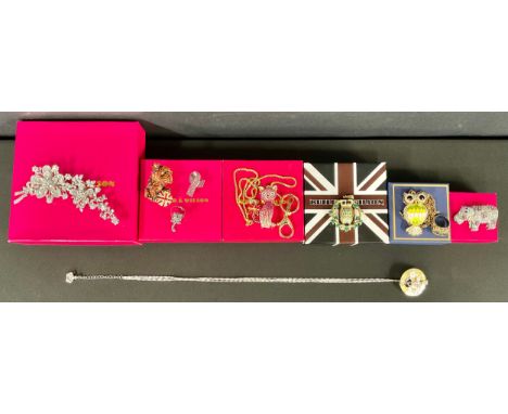 Jewellery - a Butler &amp; Wilson silver coloured metal brooch, cast with ribbons and blossom, inset with stones, 15cm long o