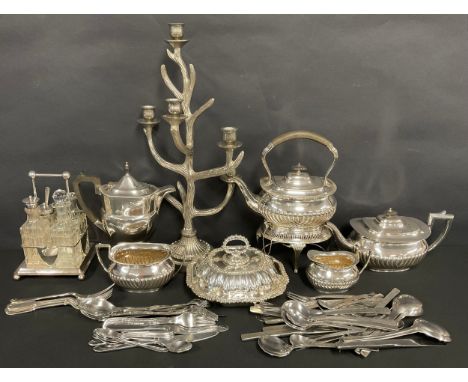 A silver plated four piece tea set, inc spirit kettel on stand, tea pot, milk jug etc,  entree dish, condiment stand,  flatwa