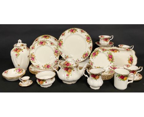 A Royal Albert Old Country Roses dinner and tea service for six, comprising teapot, saucers, cups, dinner plates, side plates