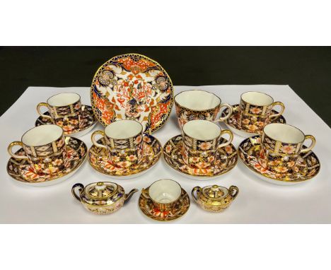 A set of six Royal Crown Derby 2451 Imari coffee cans and stands; a 2451 pattern miniature part tea servie, comprising, teapo