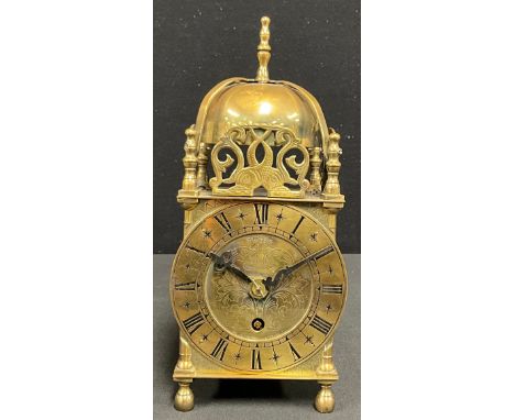 A 17th century style brass lantern clock