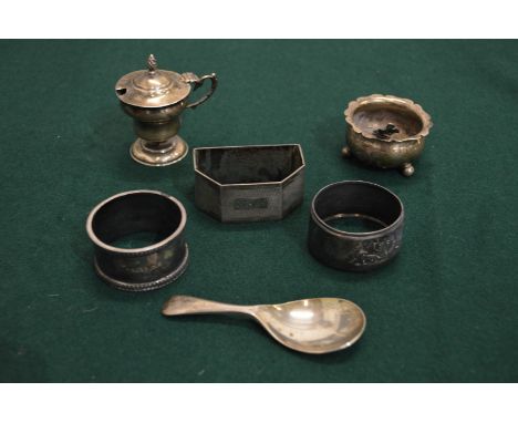 Silver napkin rings, a caddy spoon etc.