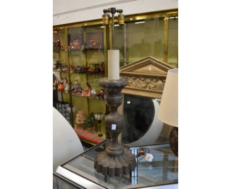 A large metal table lamp.