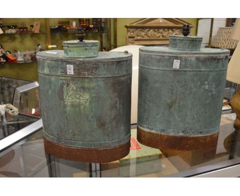 A pair of unusual metal table lamp bases.