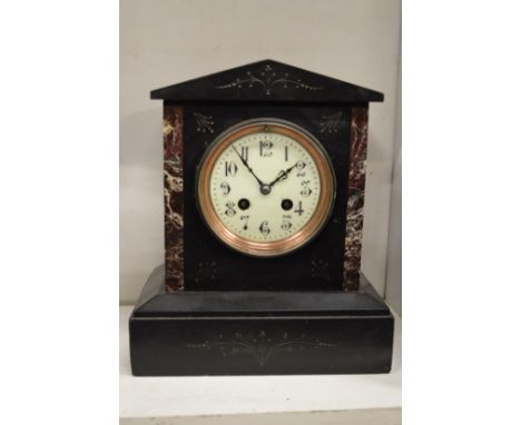 A Victorian slate mantle clock.
