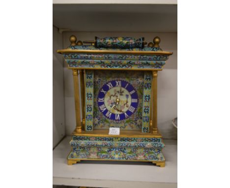 An unusual cloisonne enamel decorated mantle clock.
