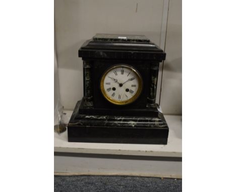 A Victorian slate mantle clock.
