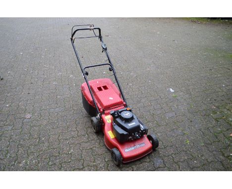 A Mountfield petrol rotary lawn mower.