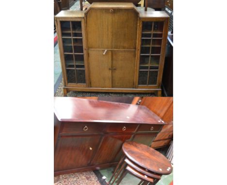 A 1970's Stagg Minstrel dining room sideboard;  a 1970's oval nest of tables;  a 1940's oak side by side bureau
