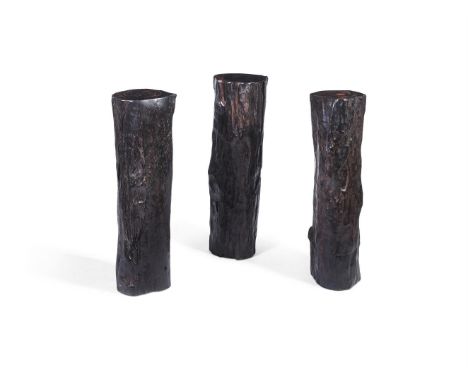 Y&nbspTHREE LARGE PETRIFIED COROMANDEL TRUNK SECTIONS  each approximately 93cm high  Condition Report:  There are scratches, 