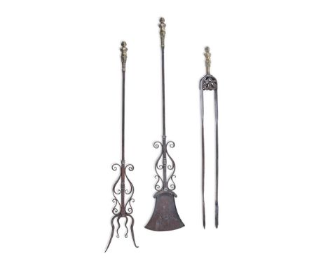 AN UNUSUAL BARONIAL SET OF THREE BRASS HANDLED IRON FIRE TOOLS  ENGLISH, 19TH CENTURY  Handles in the form of putti herms, or