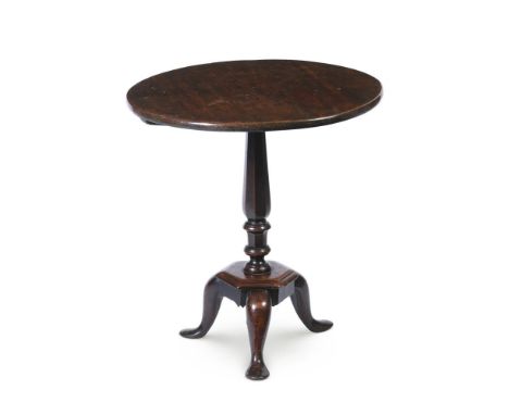 A WALNUT TRIPOD TABLE EARLY 18TH CENTURY 64cm high, the top 60cm diameter         Condition Report:  Table with the marks, kn