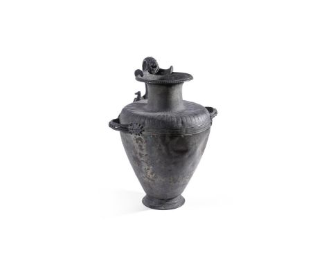 
	
		AFTER THE ANTIQUE- A BRONZE HYDRIA 
		NEAPOLITAN, 19TH CENTURY 
		The water jug with pouring handle issuing from winged 