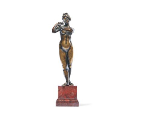 A FRENCH BRONZE FIGURE OF A FEMALE FLAUTIST  18TH CENTURY  Now on a base  figure 23cm high, 30cm high overall, base 7cm wide