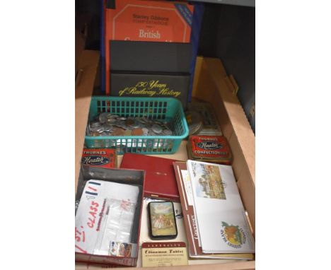 A selection of vintage, part filled stamp albums, loose stamps, first day covers, cigarette cards, coins including sixpences,
