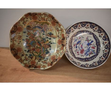 A vintage Panda pottery bowl, having colourful blue floral and bird decoration on a white ground, makers mark to base, w28cm.