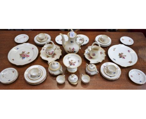 A Copenhagen Porcelain coffee set, floral design on ivory ground, gilt edge, comprising coffee pot, six coffee cups and sauce