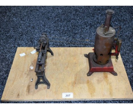 A Live Steam stationary boiler engine and miniature driven lathe, mounted upon a plywood base, approx 26cm high