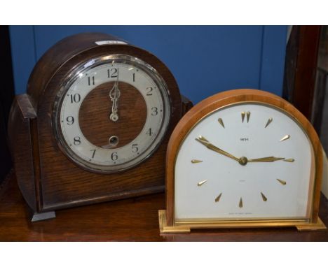 A Smith's mantel timepiece, eight day floating balance, the arched dial with baton indicators, 17.5cm, mid-20th century; an o