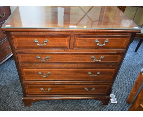 A George III style chest, of small proportions, rectangular top above two short and three long drawers, bracket feet, 73cm hi