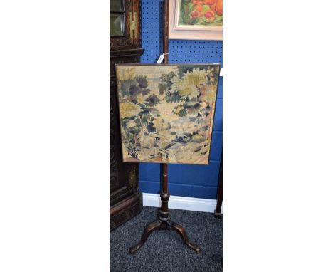 A '19th century' pole screen, rectangular tapestry screen, triform base, 147cm high