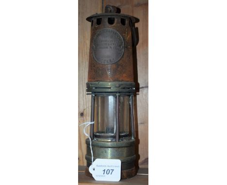 An Eccles Protector Lamp &amp; Lighting Co Ltd type SL Ministry of Power miner's safety lamp, 25.5cm high