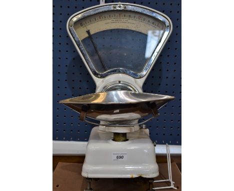 A set of vintage Avery enamel counter top shop scales