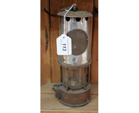 An Eccles Protector Lamp &amp; Lighting Co Ltd type S Prestwichs Patent Protector miner's safety lamp, 22.5cm high 
