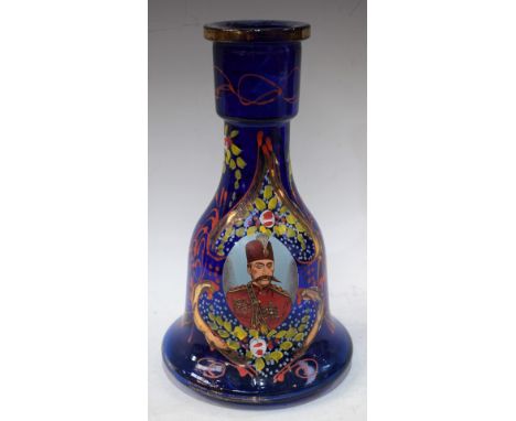 An Ottoman glass hookah base, decorated in polychrome with a portrait of Mehmed VI, within an oval reserve, the ground painte