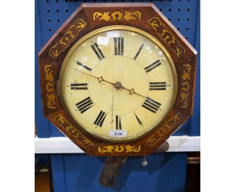 A brass inlaid mahogany wall clock