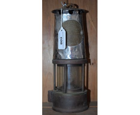 An Eccles Protector Lamp &amp; Lighting Co Ltd type SL Ministry of Power miner's safety lamp, 23cm high