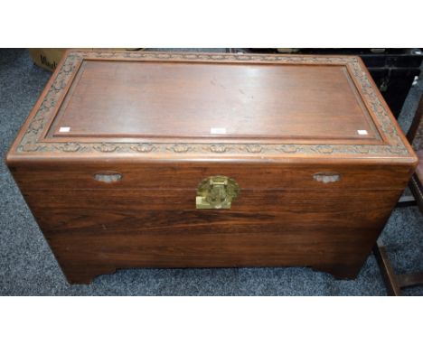A Chinese camphor chest, hinged top enclosing a sliding tray, bracket feet, 101.5cm wide