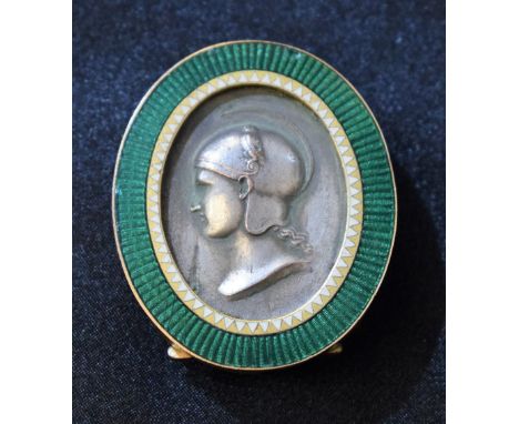 A 19th century gilt and enamel oval miniature