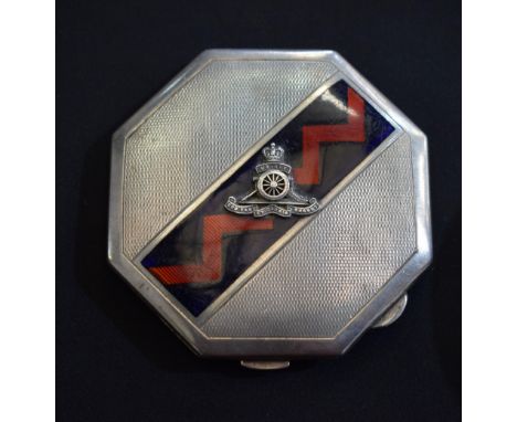 Military Interest - an Art Deco style silver and enamel compact, hinged cover applied with the insignia of the Royal Artiller